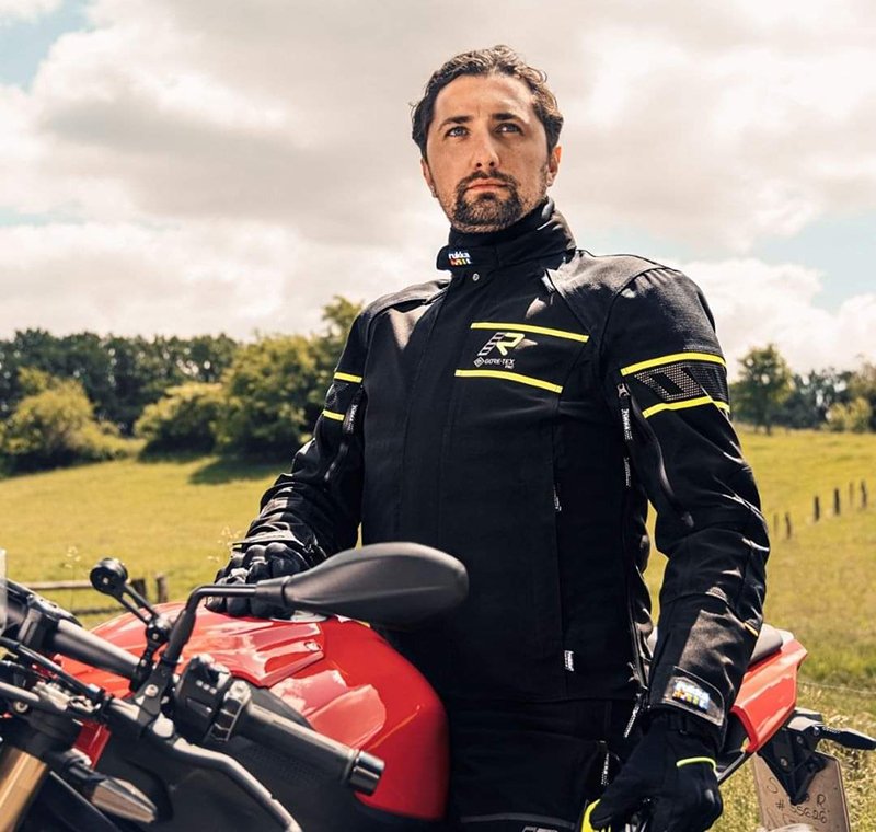 Guy wearing black and yellow Rukka Nivala